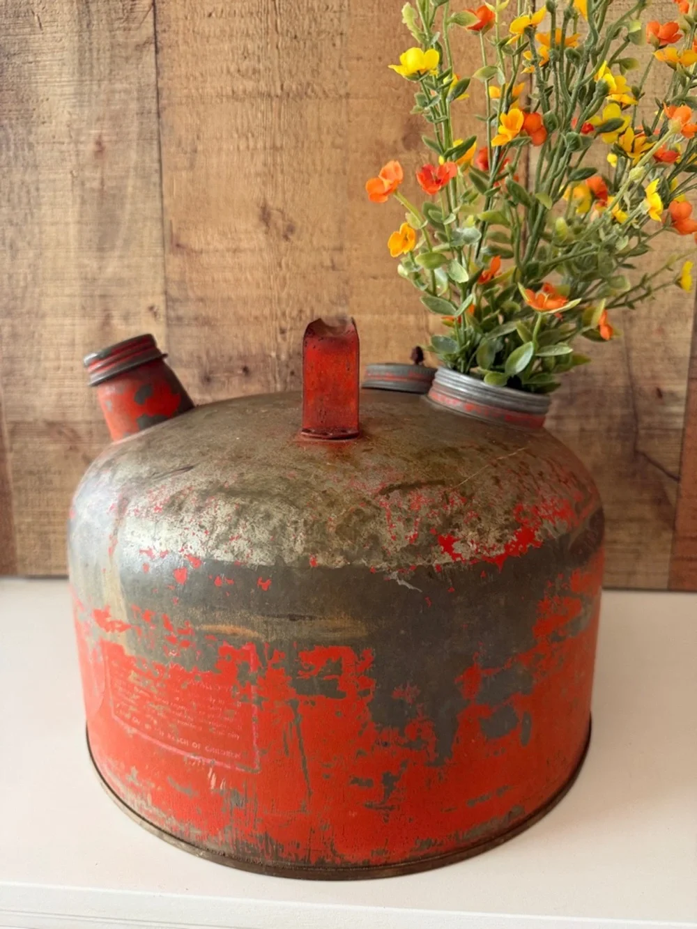 Vintage Rustic Distressed Orange Metal Gas Can with Faux Floral